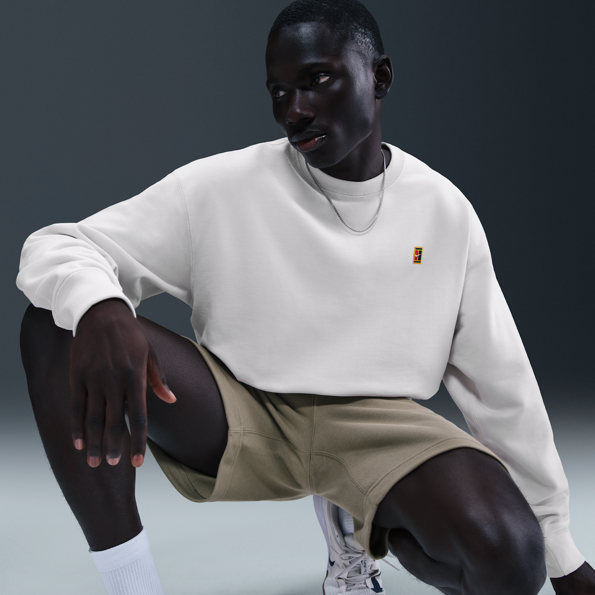 NikeCourt Men's French Terry Crewneck Top Phantom