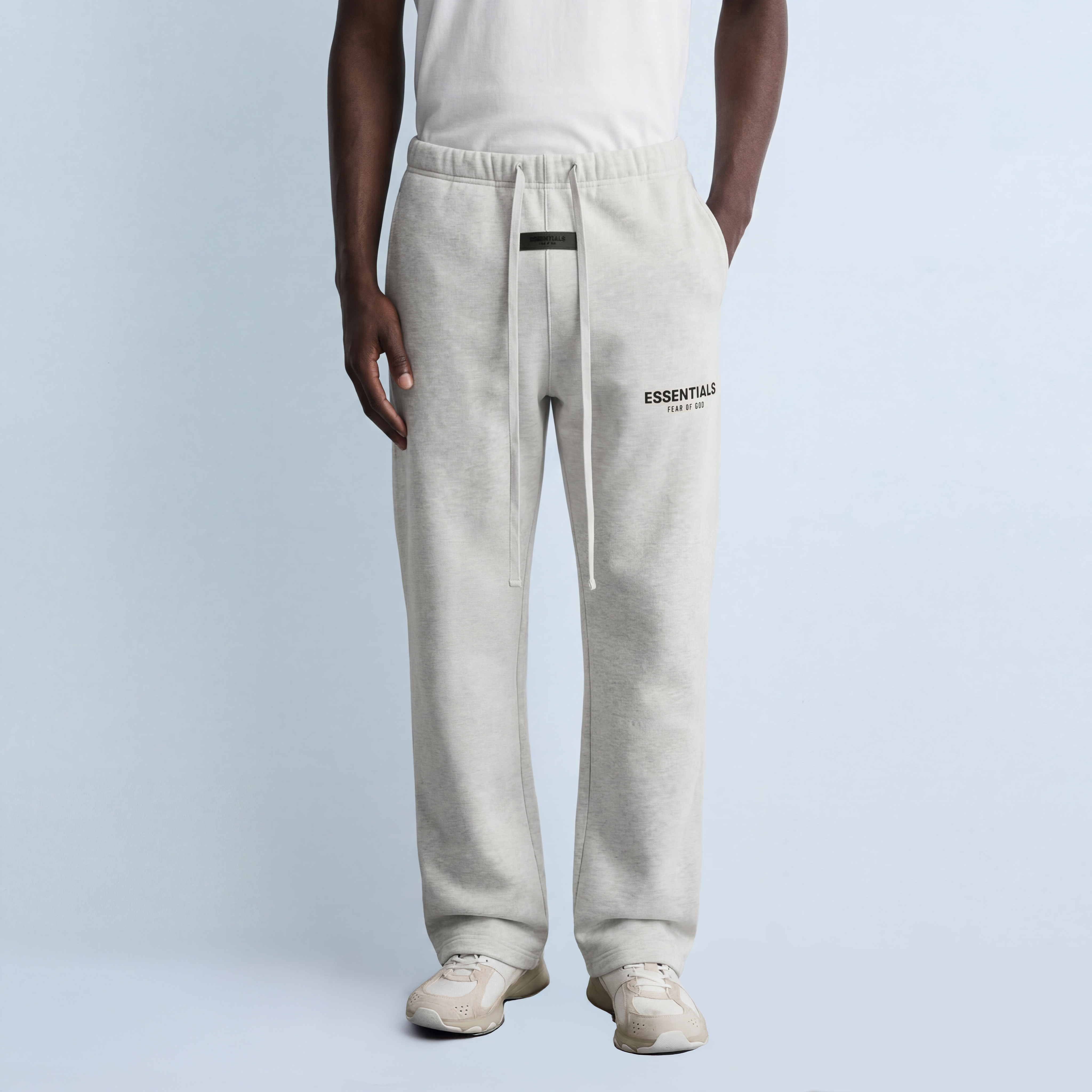Model wearing relaxed essentials light oatmeal sweatpans